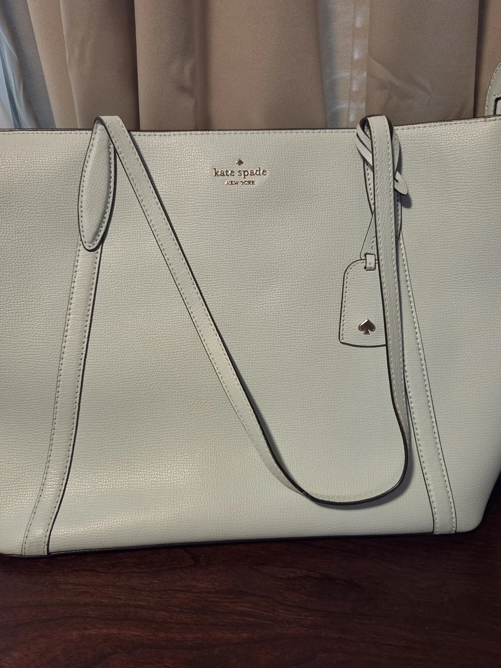Michael Kors, Kate Spade And Dooney And Burke